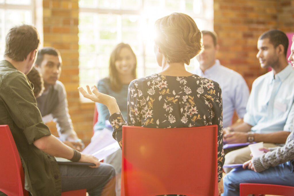 Executive reviewing 360-degree feedback report to boost team productivity